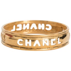 A 1990s Slim Chanel Gold Plated Bangle