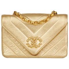 1991 Chanel Gold Chevron Quilted Metallic Lambskin Retro Pearl Mini Flap Bag