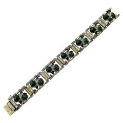 Silver, clear and coloured paste 'Cartier-style' bracelet , France, 1920s