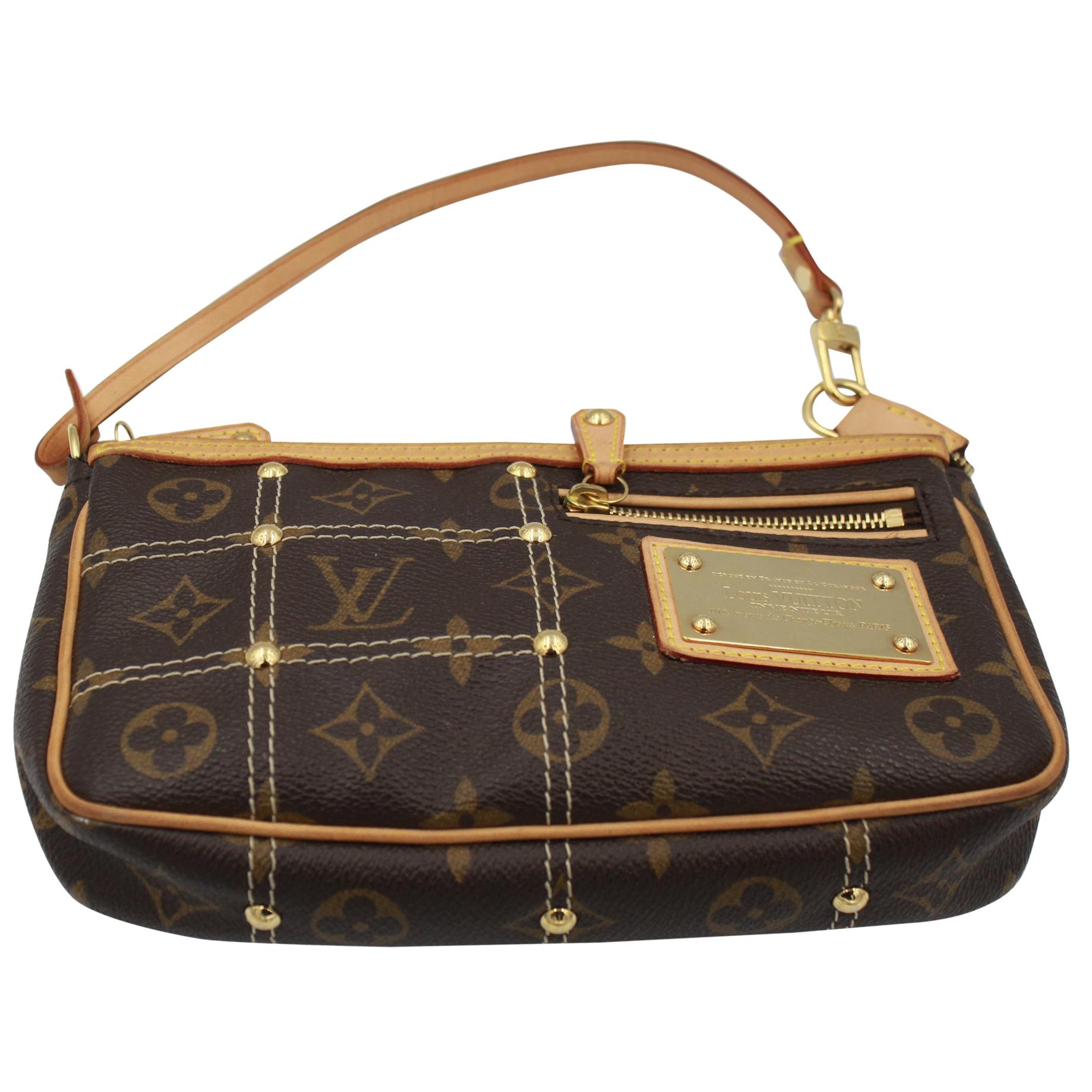 Louis Vuitton Limited Edition Riveting Accesoire Bag / Clutch