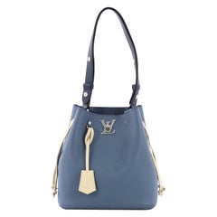 Louis Vuitton Lockme Bucket Bag Braided Leather at 1stDibs