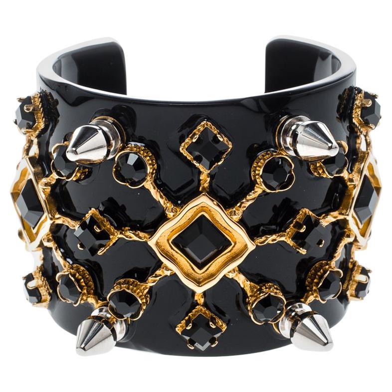 Dolce und Gabbana Zweifarbiges offenes Manschettenarmband mit schwarzer Kristallverzierung und Spike