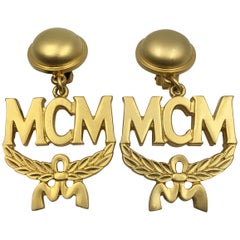 Vintage MCM Wreath Logo Matte Gold Tone Clip On Earrings