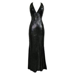 Un abito da sera con paillettes ricamate di Loris Azzaro Couture circa 1970/1980