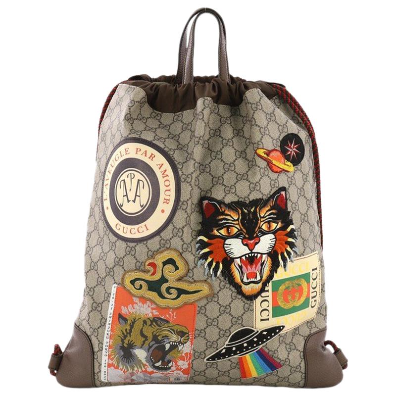 Gucci Courrier Soft Drawstring Backpack GG Coated Canvas with Applique ...
