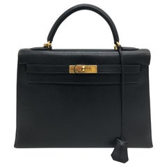 Hermes Schwarz Kelly 32cm in Evergrain