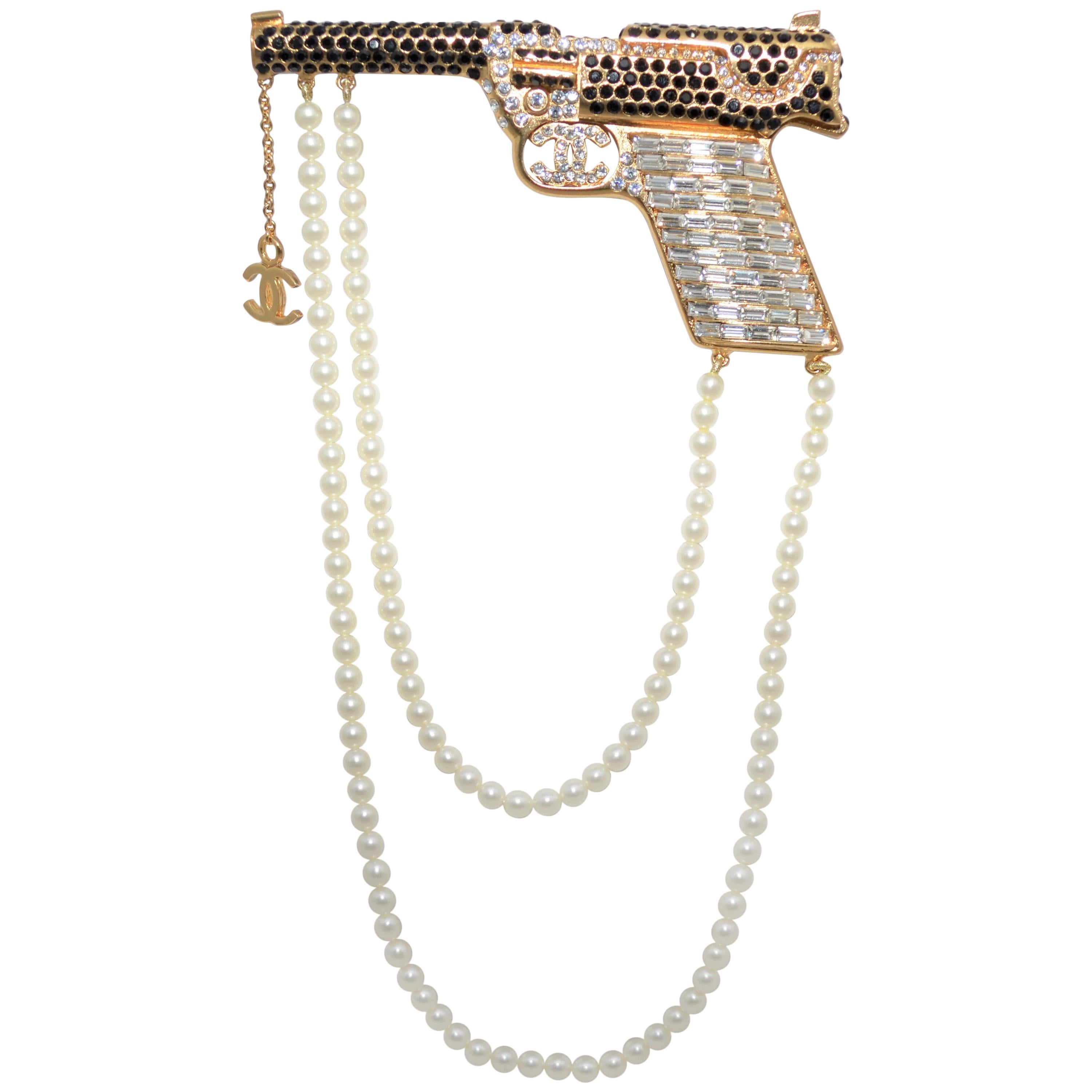 2001 A Chanel Gun Brooch Pin with Rhinestones and Pearls