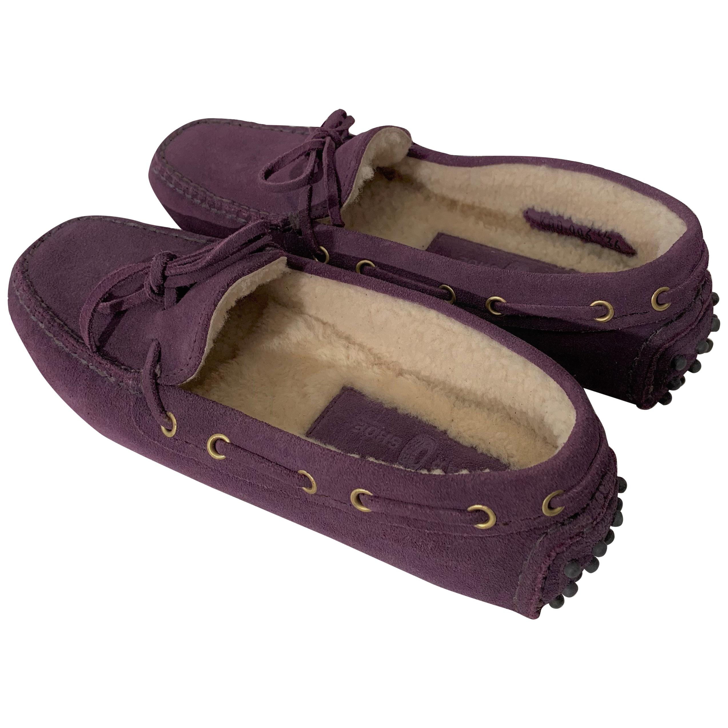 The Original Car Shoe by Prada

Brand New
* Lilac
* Suede
* Shearling Lining
* Gold Hardware
* Bow Toe
* Flat Heel
* Rubber Bumper Sole
* With Box & Dust Cover