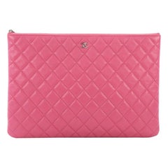 Chanel O Case Clutch Quilted Caviar Large