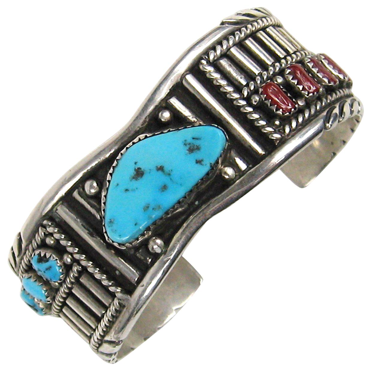 Bracelet manchette Navajo en argent sterling et argent sterling avec turquoise et corail représentant une image de miroir en vente