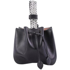 Alaia Wristlet Bucket Bag Leather and Grommet Detail Small