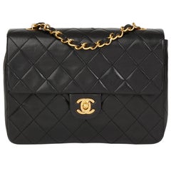 1991 Chanel Black Quilted Lambskin Vintage Mini Flap Bag