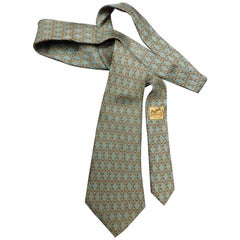  Cravate Hermès 931 HA en soie vintage à maillons en forme de mors de cheval vert olive et or