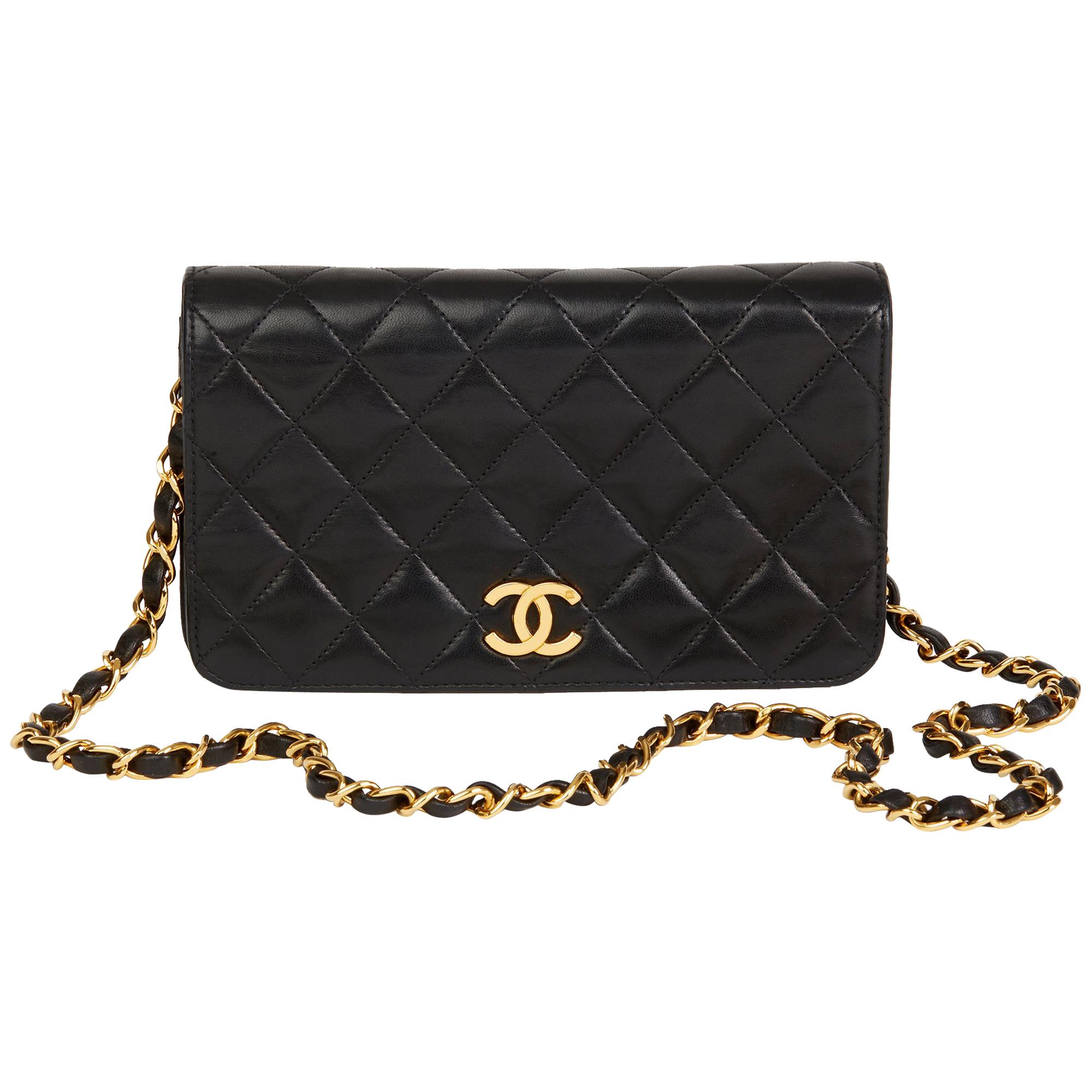 1996 Chanel Black Quilted Lambskin Vintage Mini Flap Bag at 1stDibs