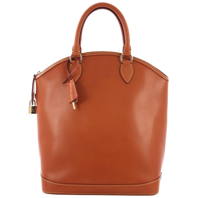 Louis Vuitton Lockit Handbag Nomade Leather Vertical at 1stDibs  louis  vuitton nomade leather, louis vuitton lockit vertical bag, louis vuitton  arch bag