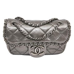 CHANEL Mini Bag in Matte Silver Quilted Leather