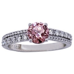 Ring in 14k White Gold with 0.71ct Intense Pink Diamond IGI Certified