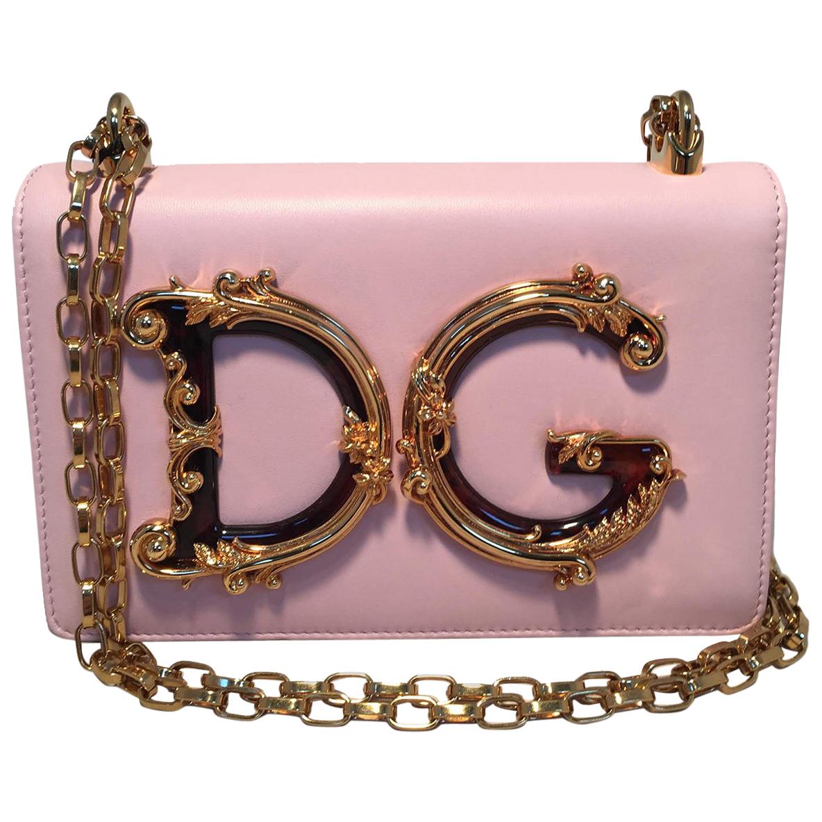 Save 17% Womens Shoulder bags Dolce & Gabbana Shoulder bags Dolce & Gabbana Leather Shoulder Bag With Logo in Pink 