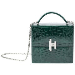 Hermès Cinhetic en cuir d'alligator Vert Fonce Verso avec matériel Palladium.