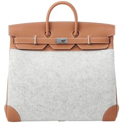 Hermès - Sac Birkin HAC 50cm TODOO en cuir Togo doré et feutre de laine gris Clair