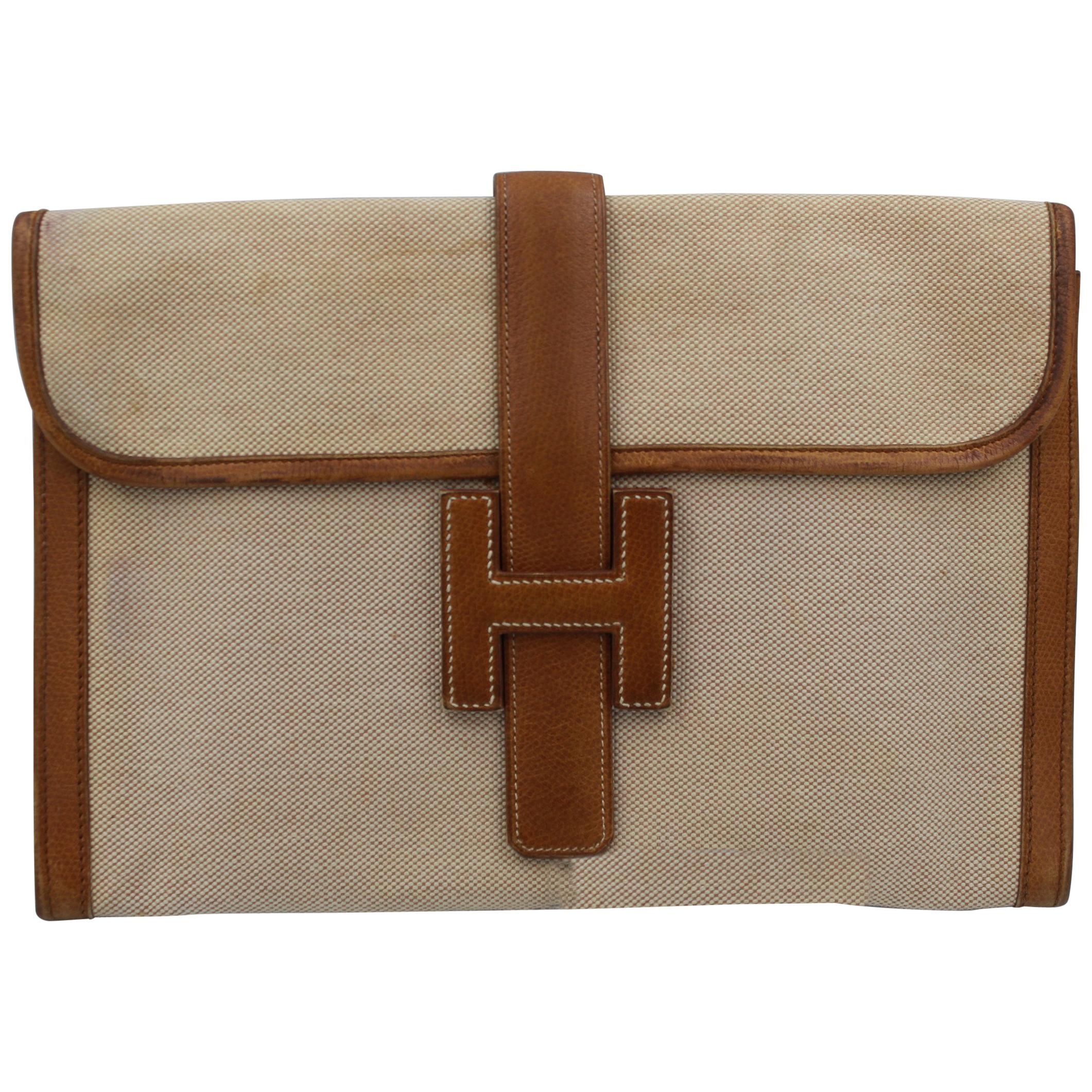 Vintage Hermes Jige MM Clutch in Canvas and Leather.