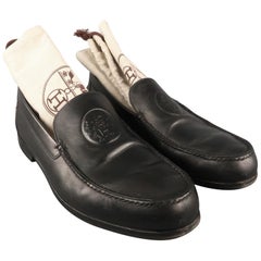 Men's HERMES Size 9.5 Black Leather Embossed Logo Slip On Loafers