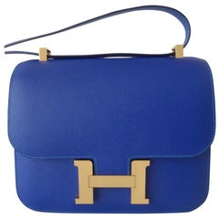 Hermès Blue Electric & Paon Epsom HSS Hufeisen zweifarbig Constance III 24 cm