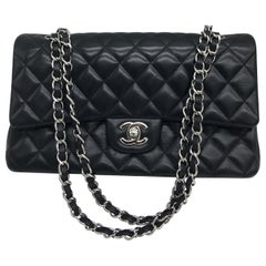 Chanel Flap Bag medium in Black with silver