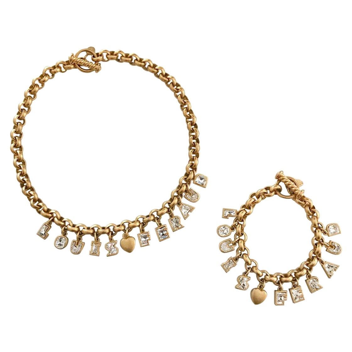 LOUIS FERAUD Gold Tone Rhinestone Filled Charm Letters Necklace & Bracelet Set For Sale
