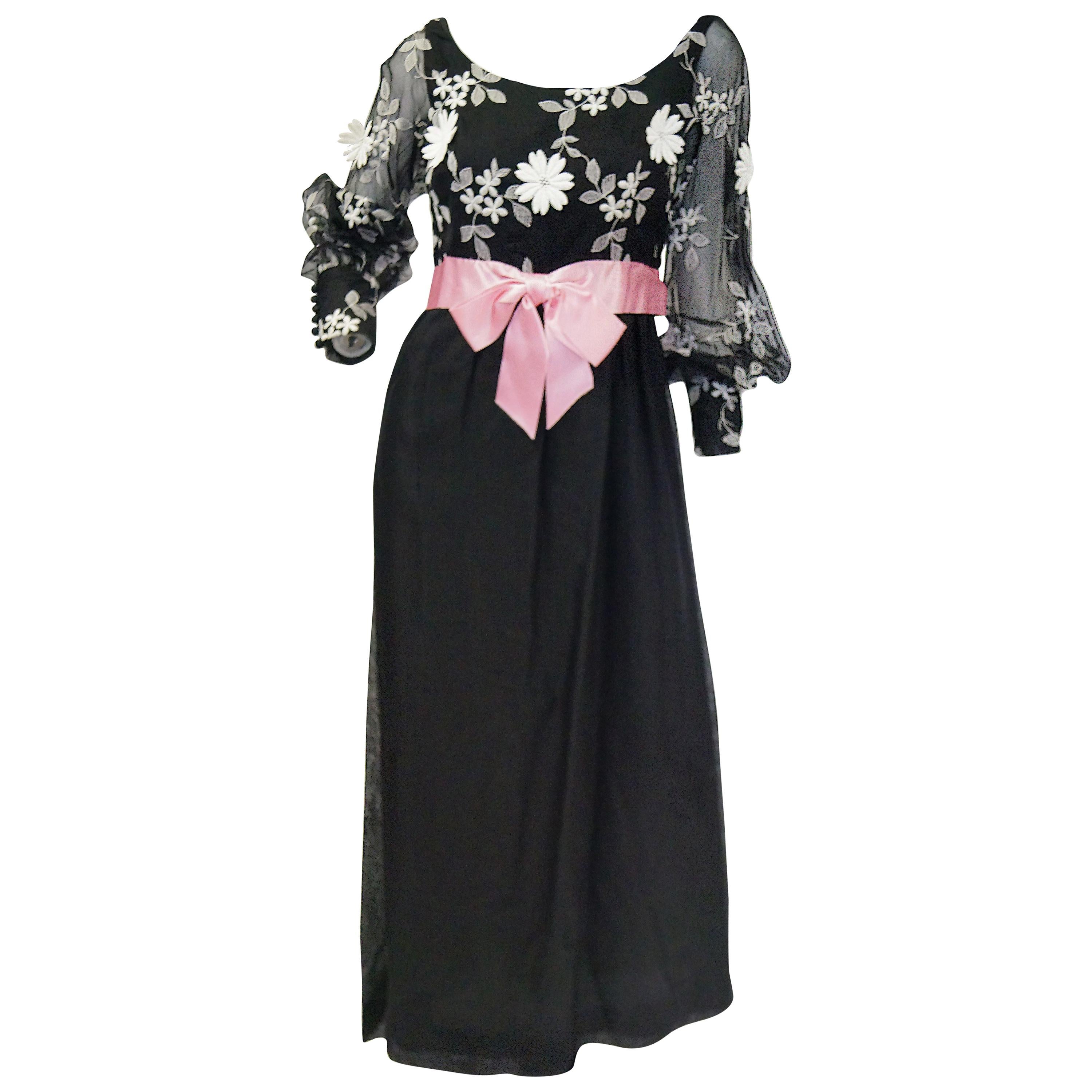 1960s Geoffrey Beene Black Evening Dress w/ White Floral Details & Pink Ribbon For Sale