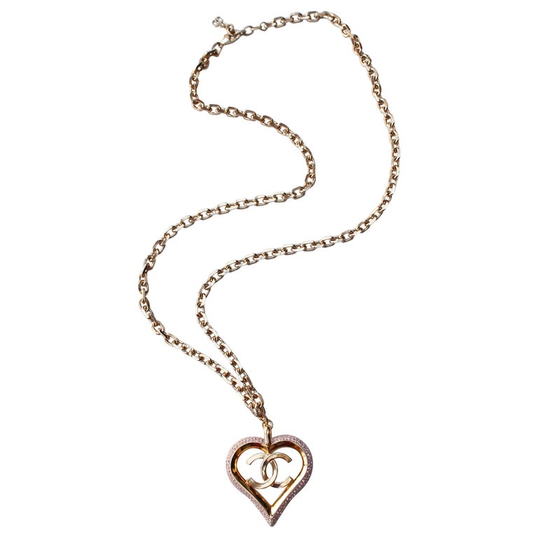 CHANEL 2013 Chain necklace with pink heart pendant and CC logo at 1stDibs