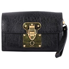 Louis Vuitton Indra Clutch Embossed Leather