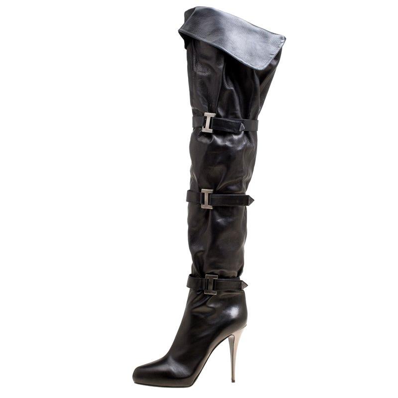 mid thigh black boots