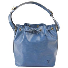 Louis Vuitton 2000s Noe Blue Epi Drawstring Bag · INTO