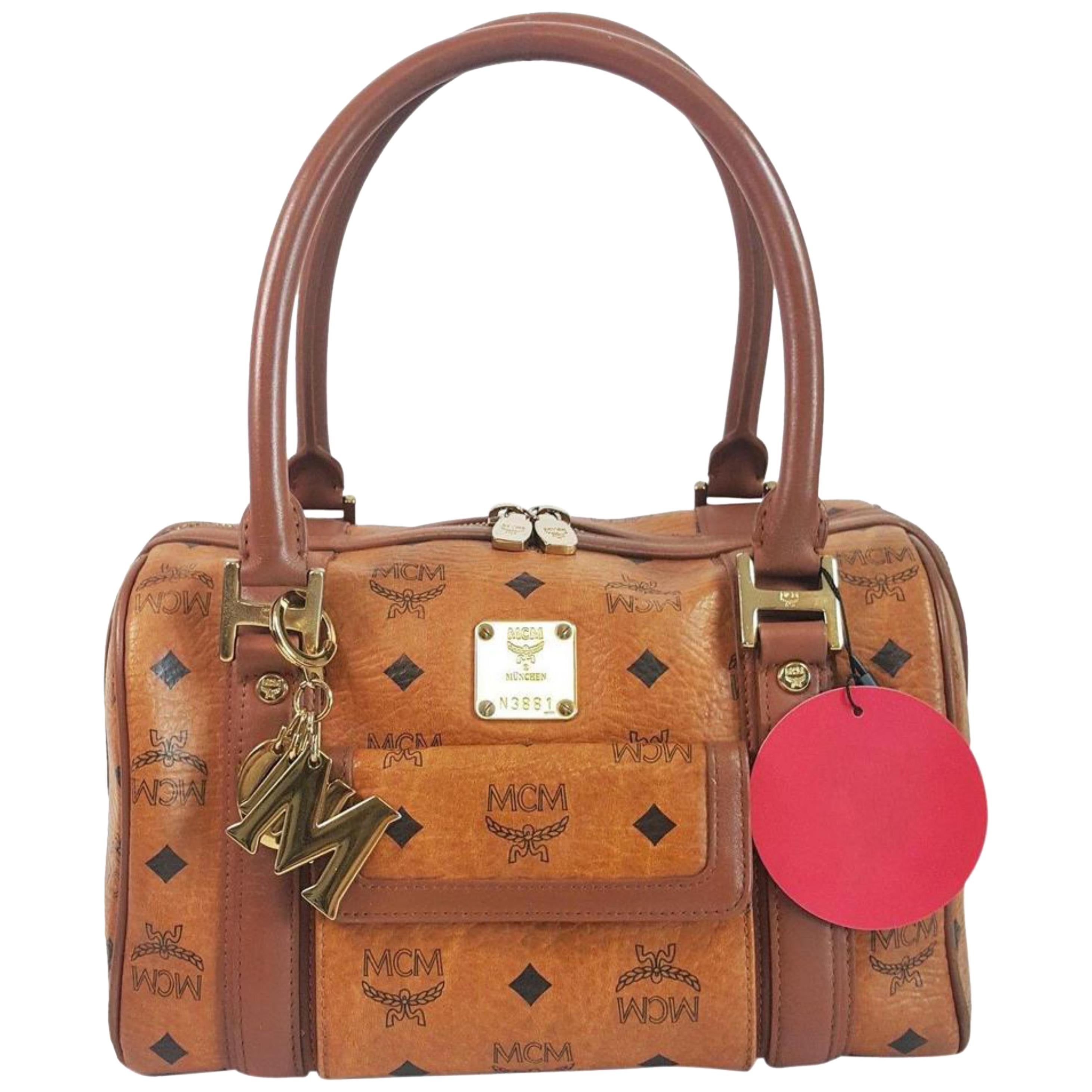 MCM Cognac Monogram Visetos Boston with Charm 867551 Brown Coated Canvas Satchel For Sale