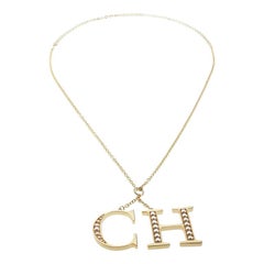CH Carolina Herrera Faux Pearl Logo Charm Gold Tone Long Pendant Necklace