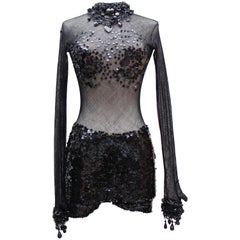 Chloé short jumpsuit in black mesh, sequins and sequins