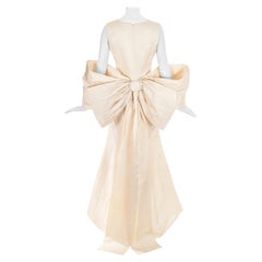 Dolce & Gabbana ivory silk fishtail wedding dress with large bow, c. 1990s