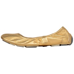 prada gold ballet flats