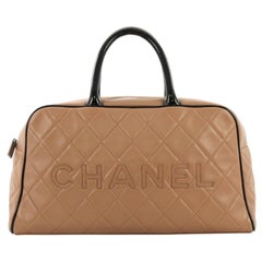 Chanel Embossed Logo Bowler Bag Quilted Leather Medium