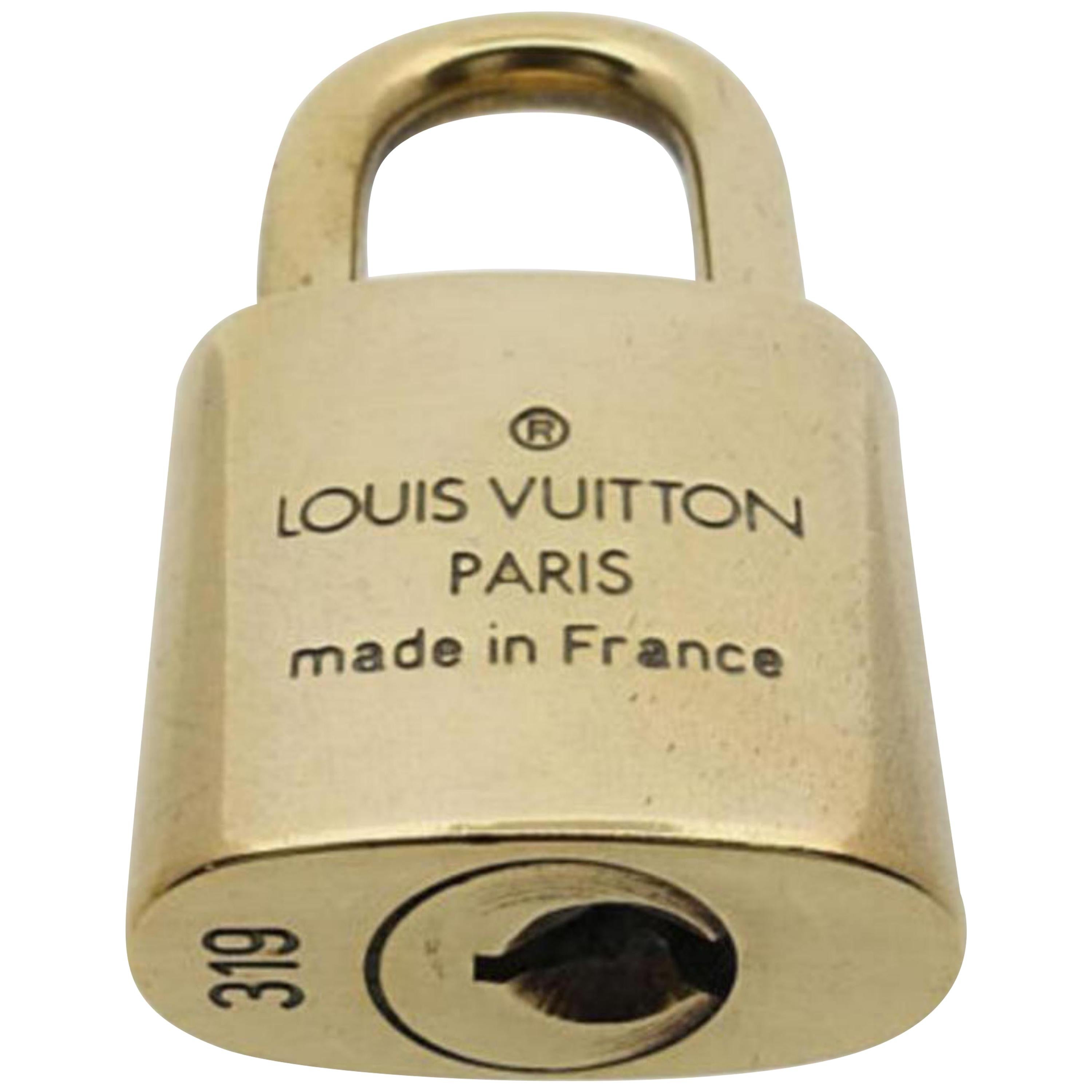 Louis Vuitton Gold Single Key Lock Pad Lock and Key 867695 For Sale