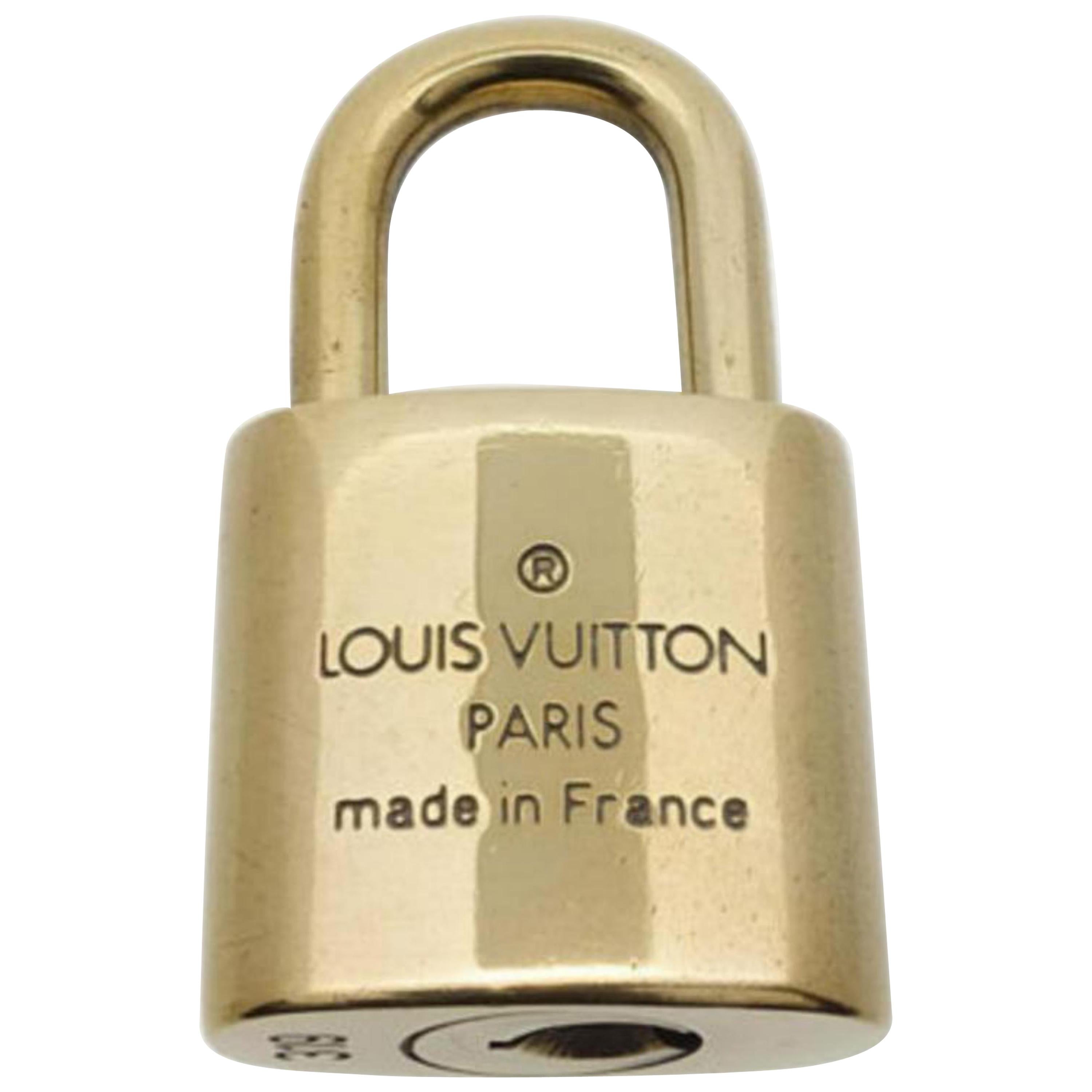 Louis Vuitton Gold Single Key Lock Pad Lock and Key 867698 For Sale