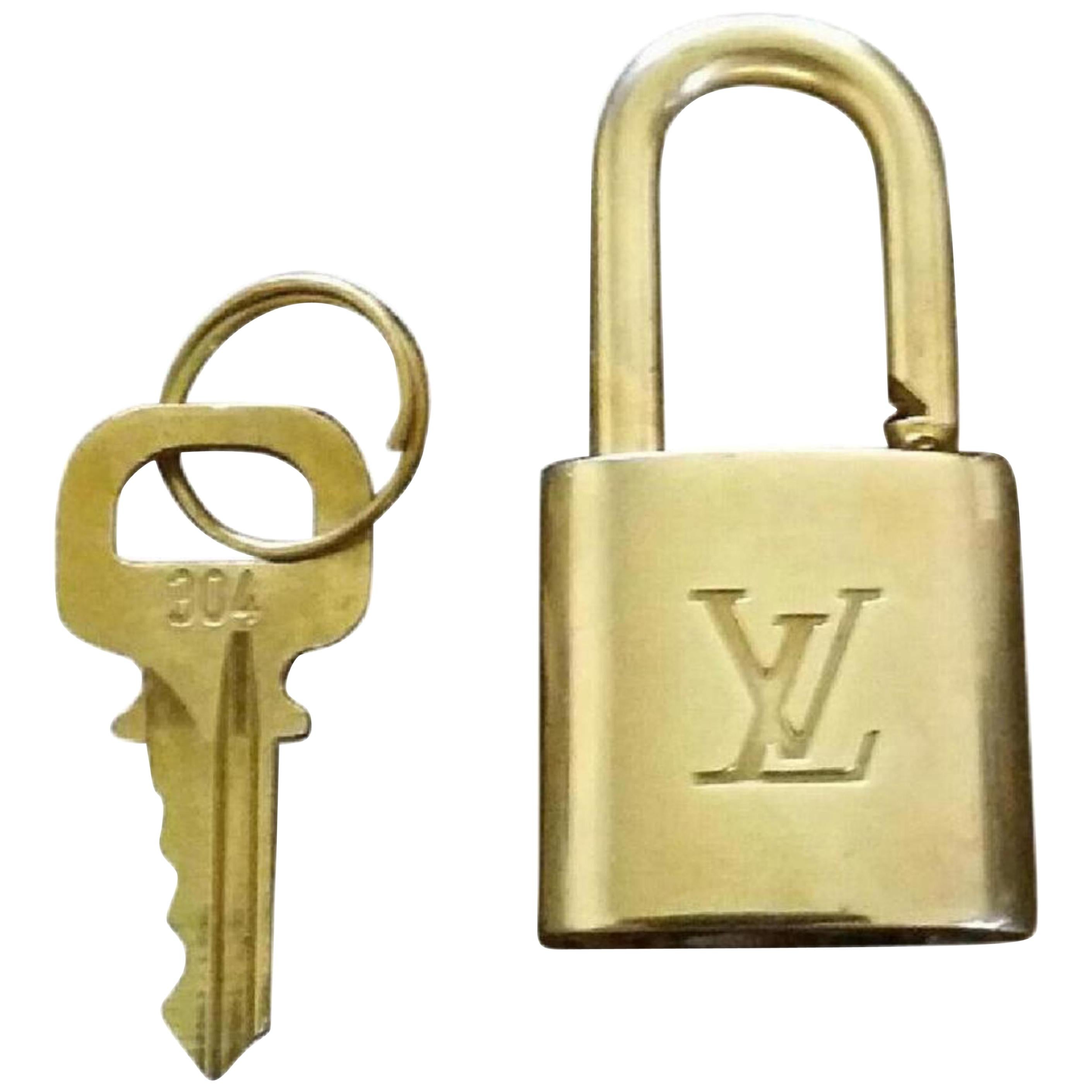 Louis Vuitton Gold Gold Single Key Lock Pad Lock and Key 867741 For Sale
