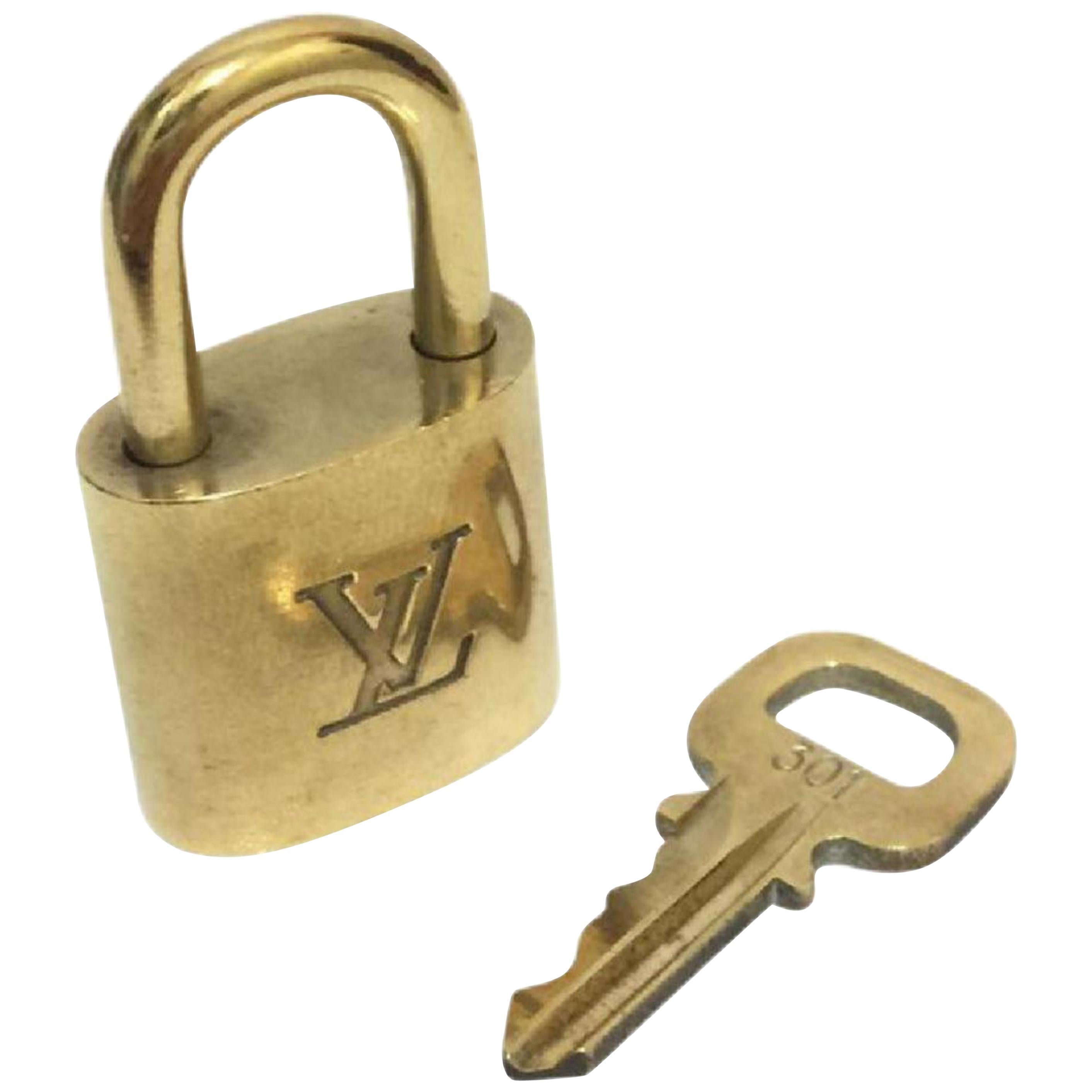 Louis Vuitton Gold Single Key Lock Pad Lock and Key 867586 For Sale