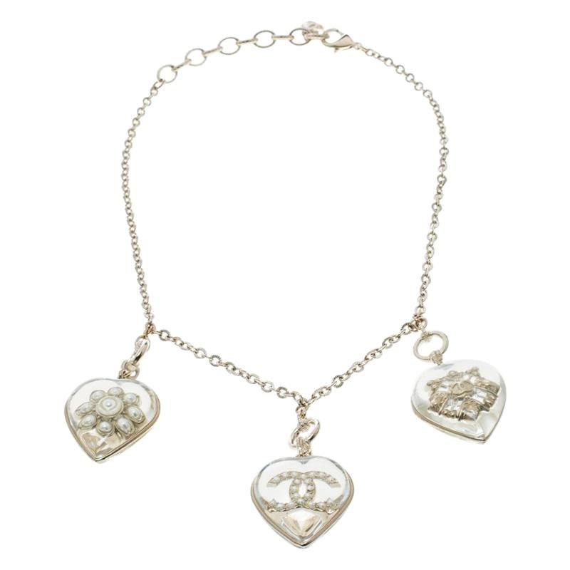 Chanel CC Aged Gold Tone Metal Motif Embedded Resin Heart Pendants Necklace