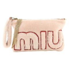 Miu Miu Logo Chain Clutch Shearling