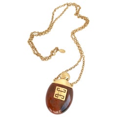 Givenchy 1970s Retro Perfume Bottle Necklace Pendant