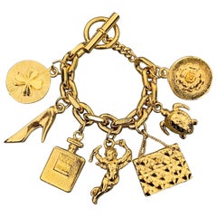 CHANEL Retro Gold Tone Angel Coco Purse Pump Perfume Charm Bracelet