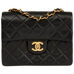 1991 Chanel Black Quilted Lambskin Vintage Mini Flap Bag