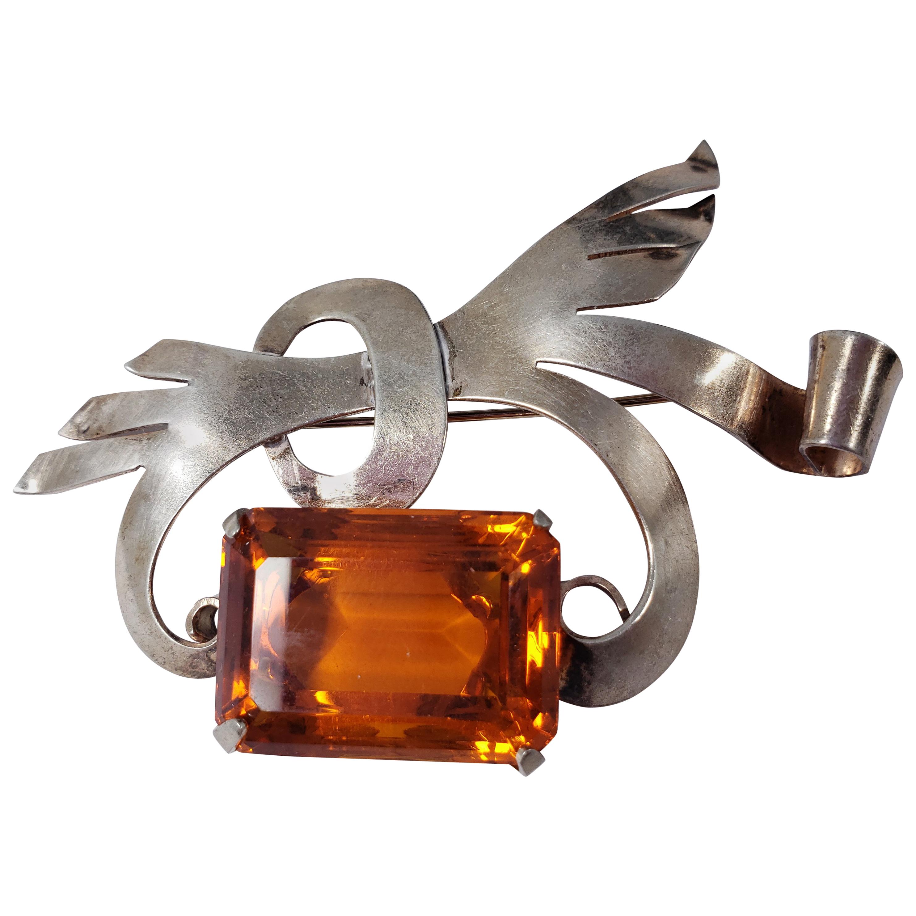 Lampl Sterling Silver Decorative Bow Motif Pin Brooch With Large Orange Crystal For Sale